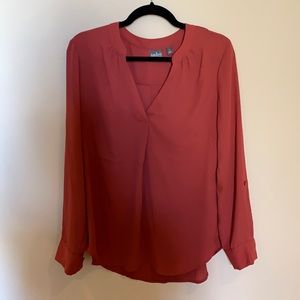 Salmon colored light blouse